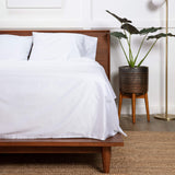 organiccottonsheetsonbedinroom