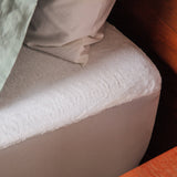 micro cotton protectorcloseuponbed